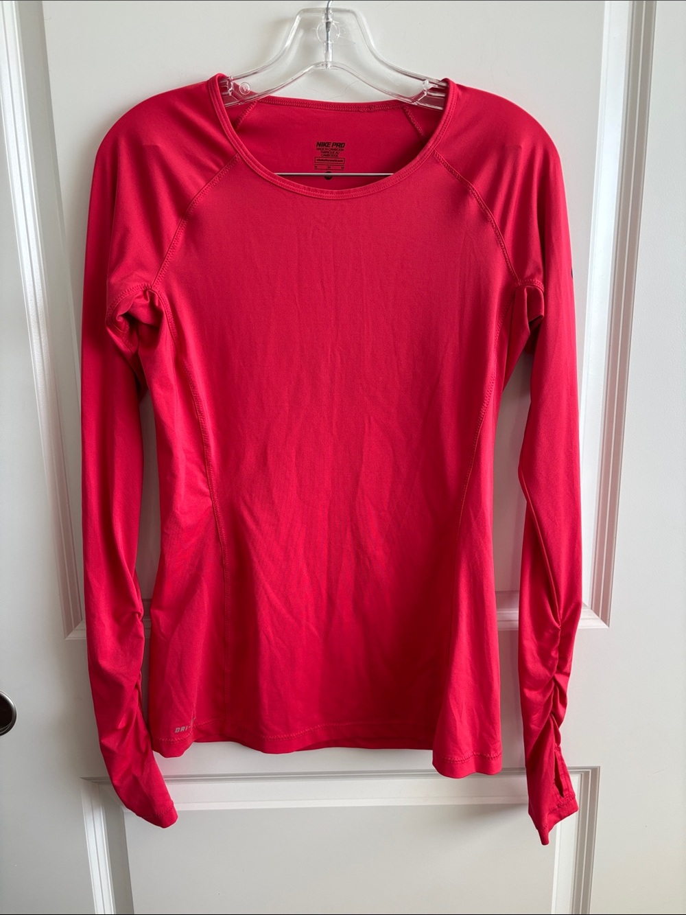 Nike Long-Sleeve Performance Top in Bright Pink